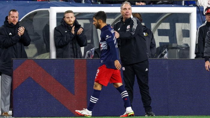 New England Revolution manager Bruce Arena and star Carles Gil